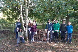 Young people with their bug hotel