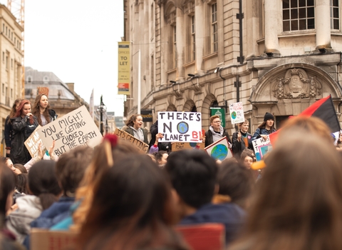 People campaigning with a 'No planet B' sign